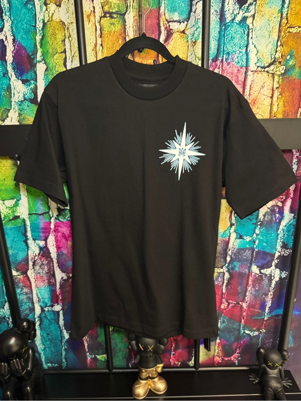 AMIRI Black Short Sleeve Tee with Light Blue Starburst Chest Graphic